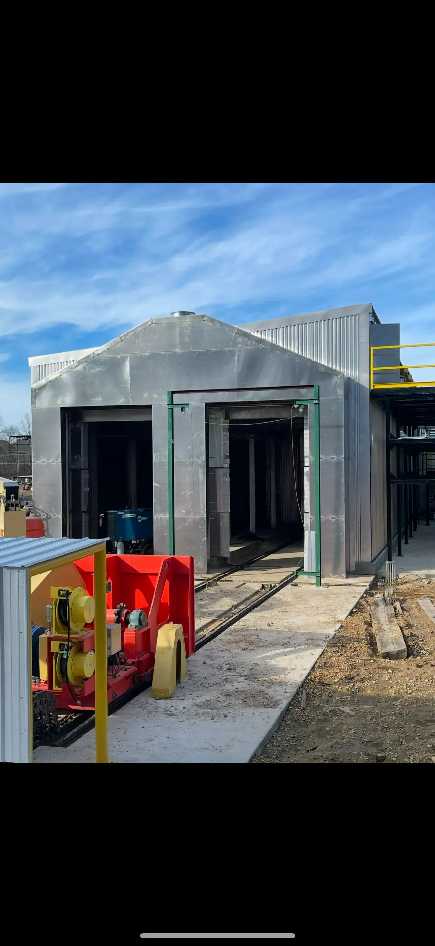 New aluminum-shell track kiln under construction with rail and transfer car