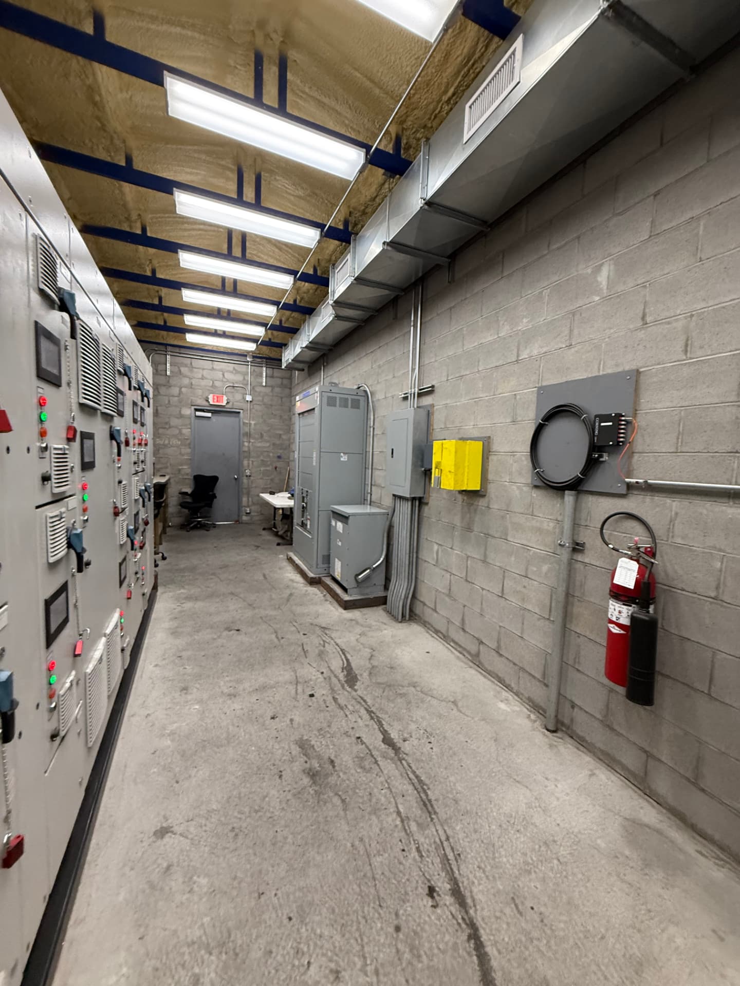 Dry kiln control room with MCC panels and kiln control cabinets